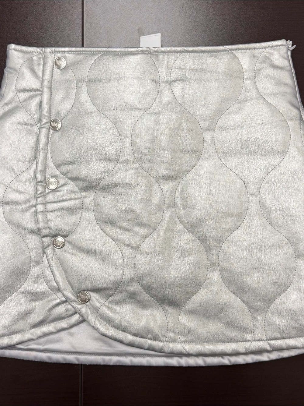 Metallic Silver Quilted Mini Skirt with Button Trim